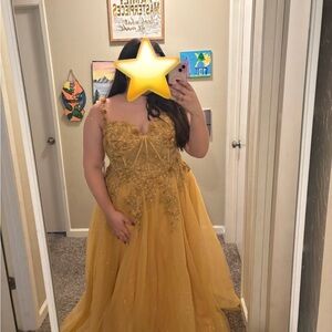 Elegant Gold Gown with Floral Details